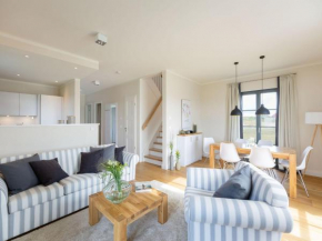 Reetland am Meer - Premium Reetdachvilla mit 2 Schlafzimmern, Sauna und Kamin E25